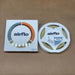 Airflo fishing line spool and packaging on a brown background